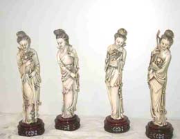 4 statuettes de femmes en ivoire